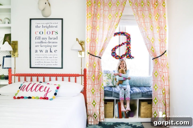 Make Small Rooms Feel Bigger 9 Genius Hacks 19 A young girl sits on a window seat hugging a stuffed animal. A crafted "A" hangs above her head and her room is colorful and bright.