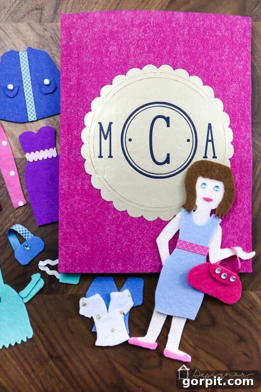 Creative Felt Doll Kit 14 Another perspective of the charming felt doll and her extensive, colorful wardrobe, highlighting the creative possibilities.