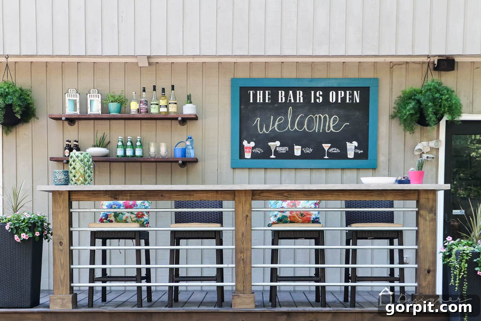 Build a Custom Outdoor Chalkboard 14 Another wide view of the outdoor chalkboard and the surrounding deck area with industrial pipe shelves