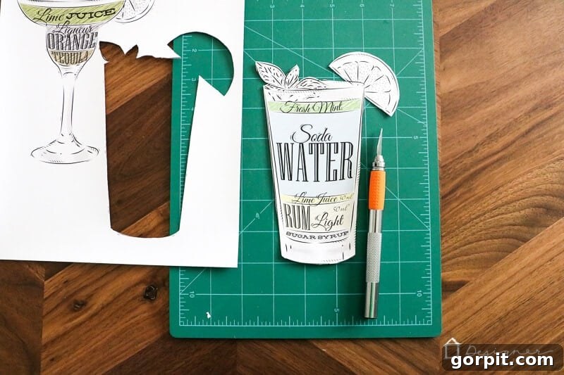 Build a Custom Outdoor Chalkboard 4 Close-up of a design being applied to a blackboard with a transfer tape