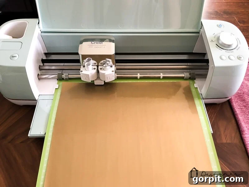 Proper placement of Cricut SportFlex Iron On on the cutting mat: shiny side down, matte side up, for perfect cuts on stretchy fabrics.