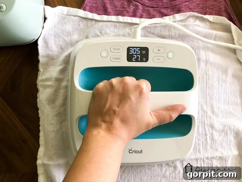 Applying Cricut SportFlex Iron On with the EasyPress: preheating, precise placement, protective sheet, and pressing for 30 seconds on activewear.