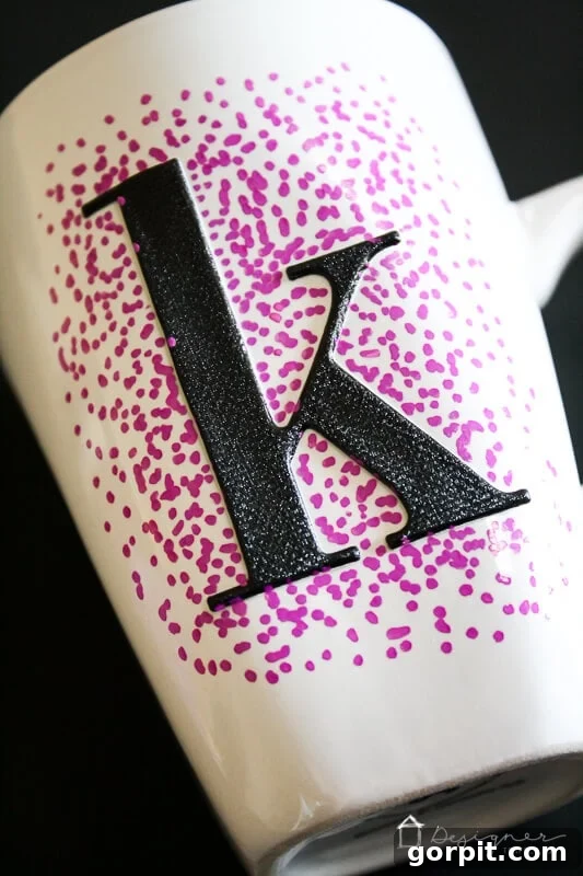 DIY sharpie mug tutorial showing the dotting technique around a stencil.