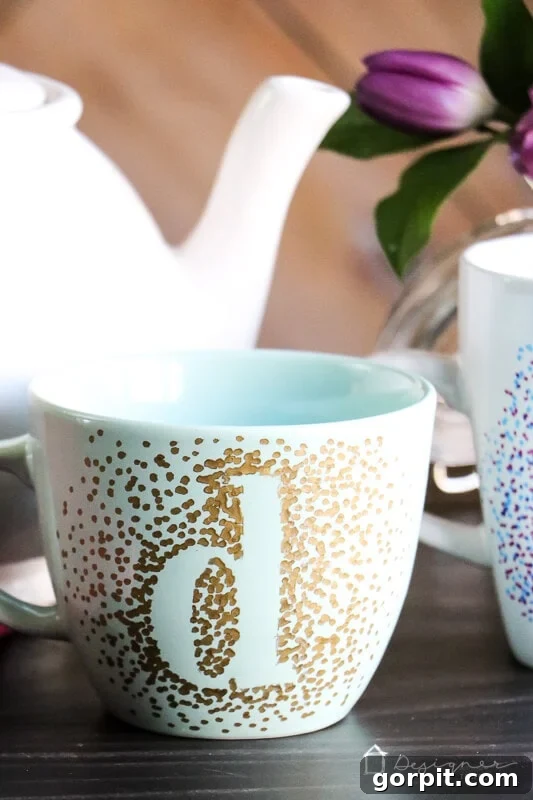 Close-up of a dotted Sharpie mug after sticker removal, showing clean edges.