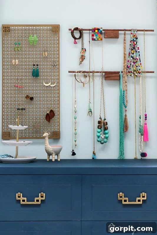 Tangle-Free Treasures: Easy DIY Jewelry Organization 15 Detailed view of earrings hanging from the decorative aluminum sheet on the DIY organizer.