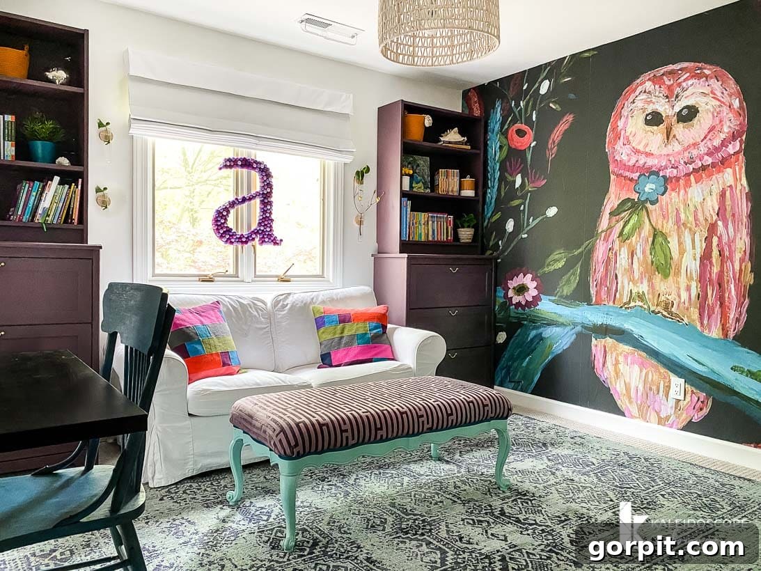 A colorful girl's room featuring a vibrant mural as its central focal point.