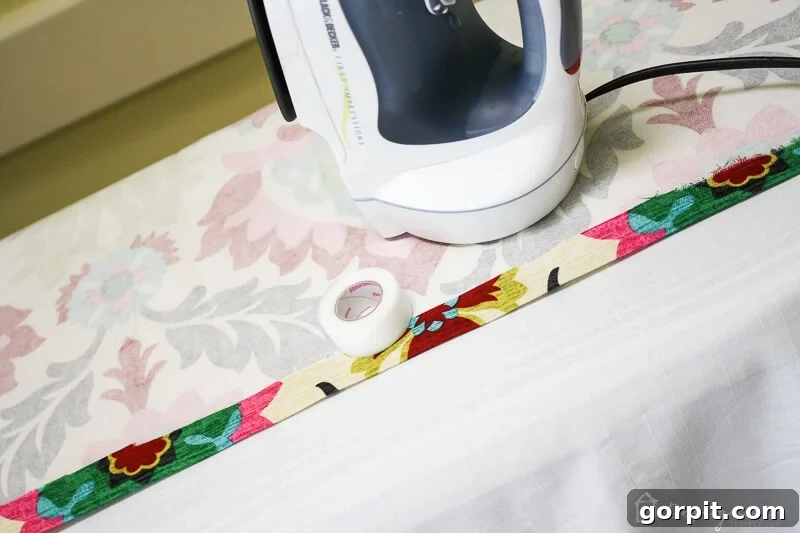 Lazy Curtains: No-Sew Hacks for Instant Style 5 how to make curtains step 2 - folding accent fabric