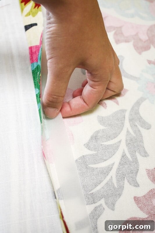 Lazy Curtains: No-Sew Hacks for Instant Style 6 how to make curtains step 3 - applying hem tape