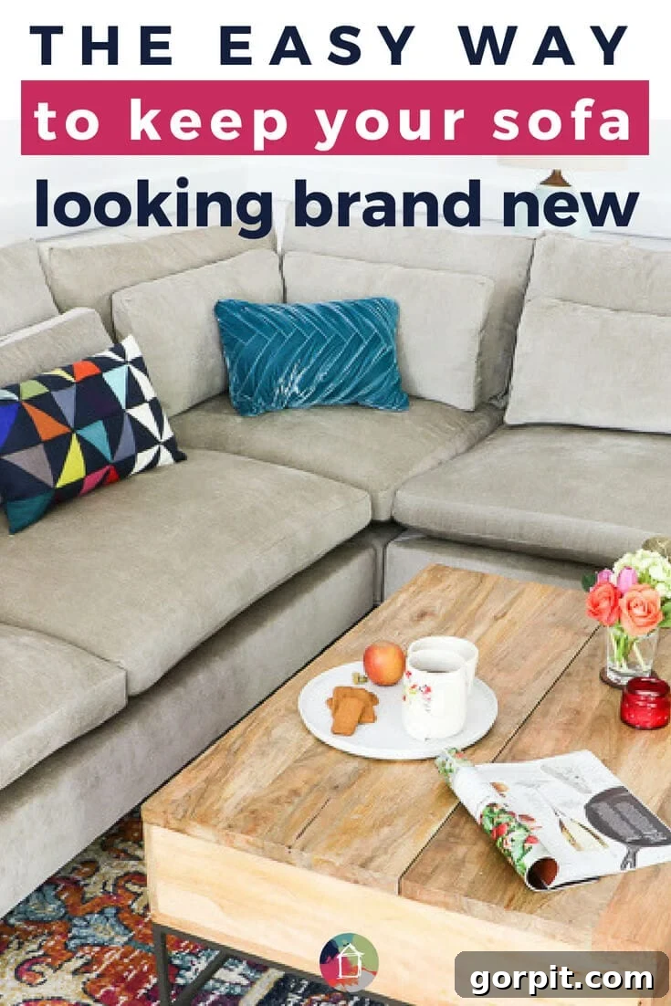 Sofa Freshness Hacks 2 A light grey L-shaped couch with bright pillows in front of a light wood pallet coffee table. The text reads, "The easy way to keep your sofa looking brand new."
