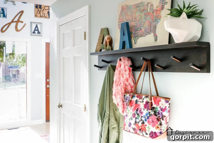 5 Habits That Keep Homes Beautiful 3 Bright and organized entryway and hall with minimal clutter, exemplifying a beautiful home's approach to organization and white space.
