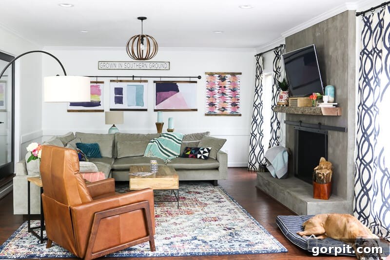 Spacious West Elm Harmony sectional sofa in a vibrant family room with colorful pillows, creating a cozy and modern seating area.