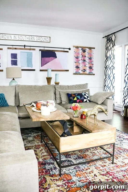 Stylish West Elm storage coffee table in a modern colorful family room, showcasing its functional design and integration with the seating area.