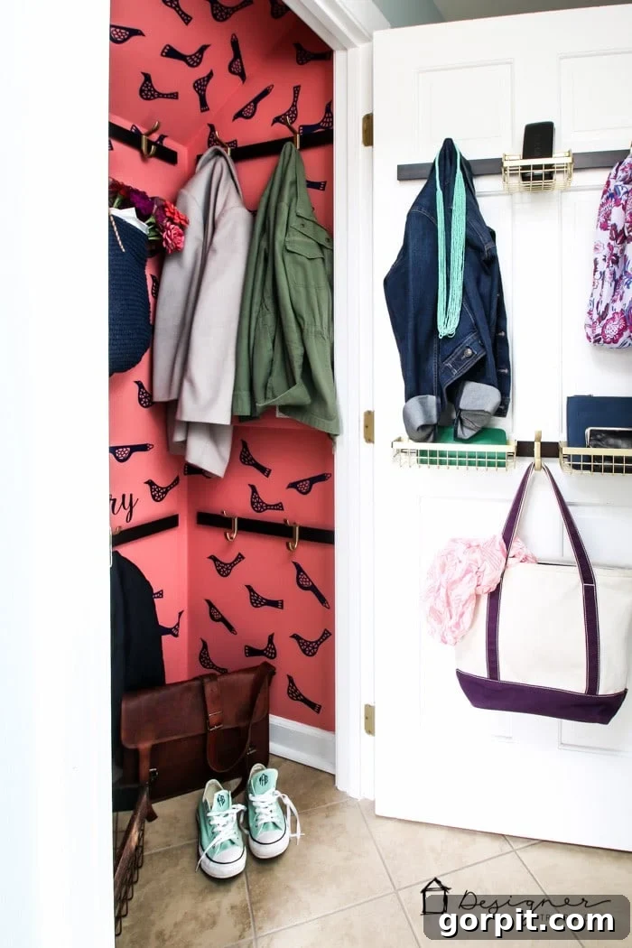 Well-organized coat closet with hanging space and storage for shoes