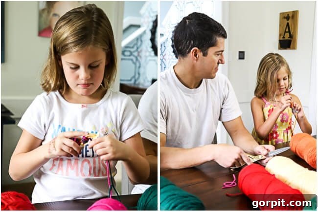Kids joyfully making yarn pom poms for a DIY wreath project
