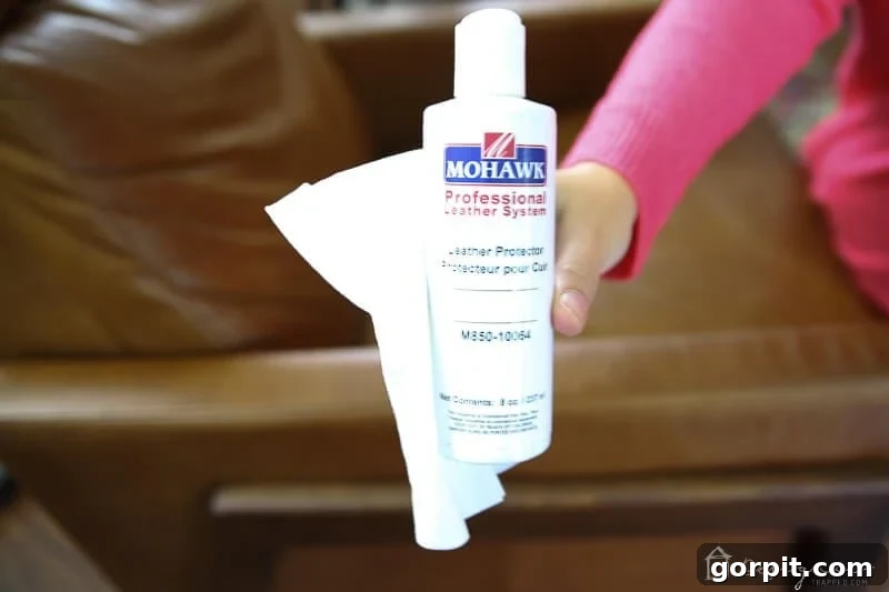 Applying an easy leather protector to the furniture surface