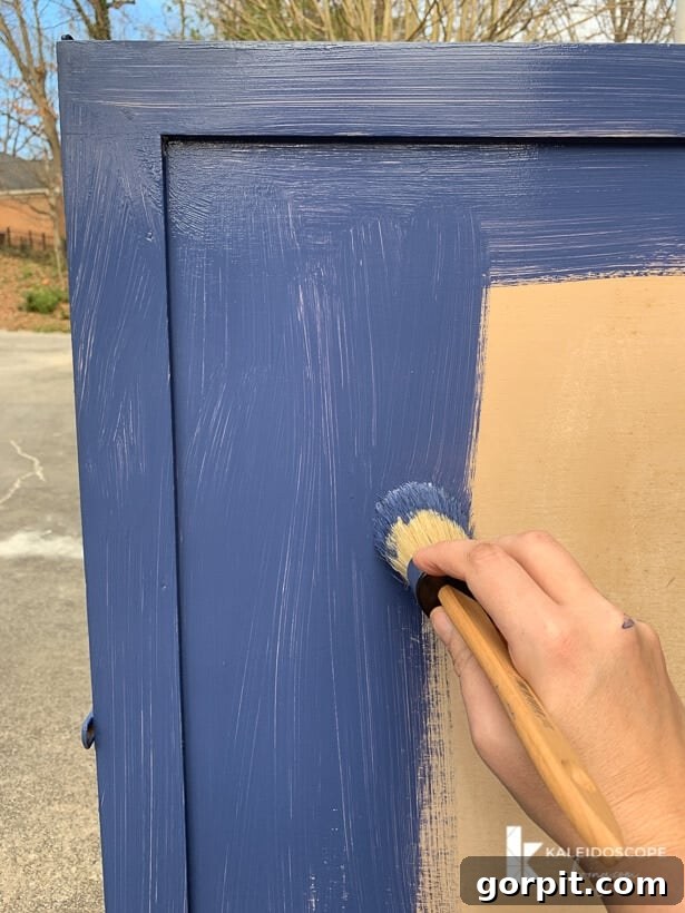 Chalk Paint Furniture Makeovers Step by Step 7 Furniture piece freshly painted with Behr Chalk Decorative Paint in Timeless Blue, ready for the next step of waxing.