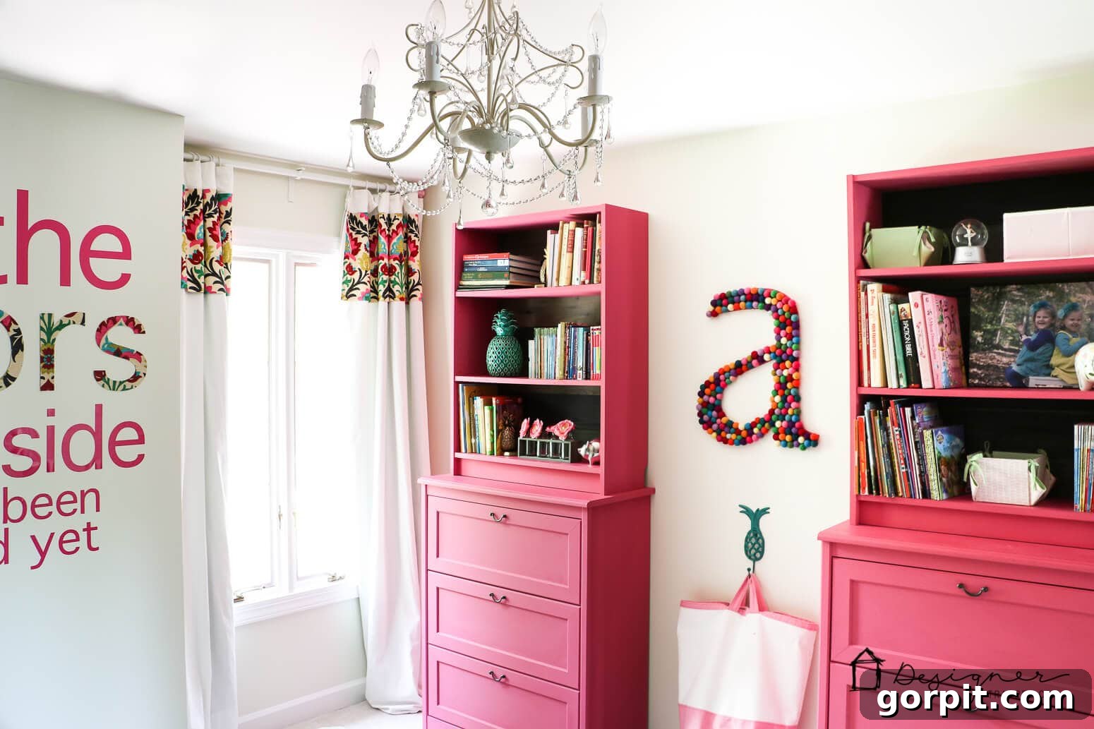Transform Your IKEA: Bookshelf & Cabinet Built-In Hacks 3 Two pink-painted Billy bookcases with IKEA drawers added below, forming a charming and functional unit. An easy IKEA bookcase hack perfect for a young girl's room, offering both shelving and drawer storage.