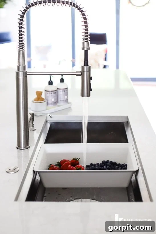 Vibrant Kitchen Transformation Unveiled 17 Kohler Prolific sink in action, featuring its modular accessories
