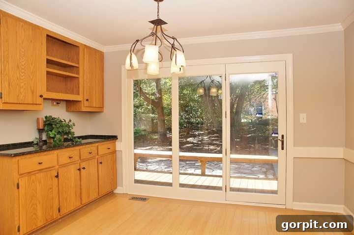 Vibrant Kitchen Transformation Unveiled 4 outdated kitchen with orange oak cabinets, illustrating the need for a modern update