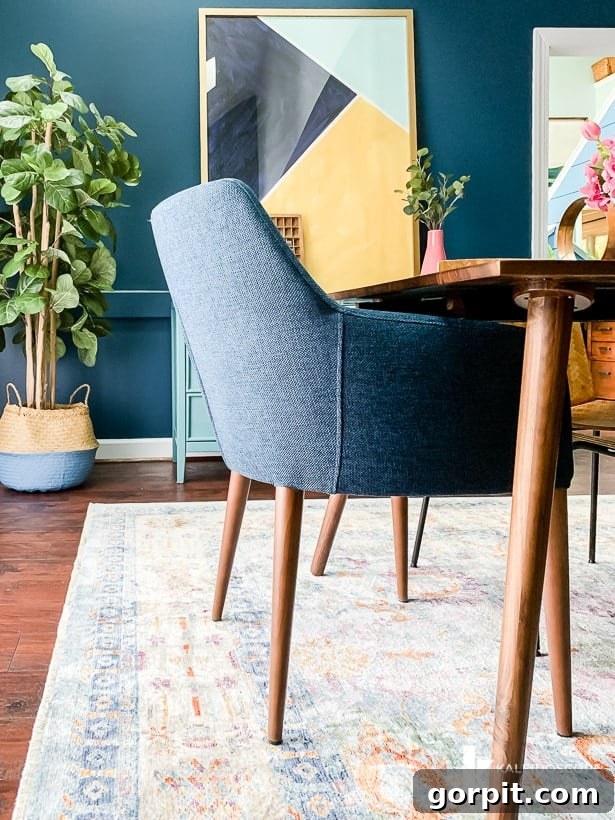 Feast dining chairs in Twilight Blue by Article, bringing comfort and style to an eclectic dining room