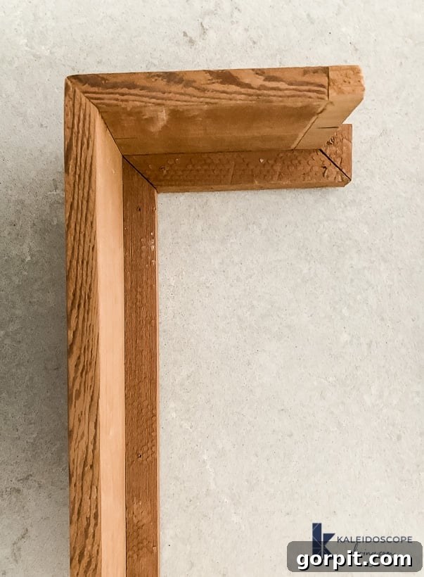 DIY Wood and White Concrete Range Hood 10 wood accent construction for DIY range hood finish