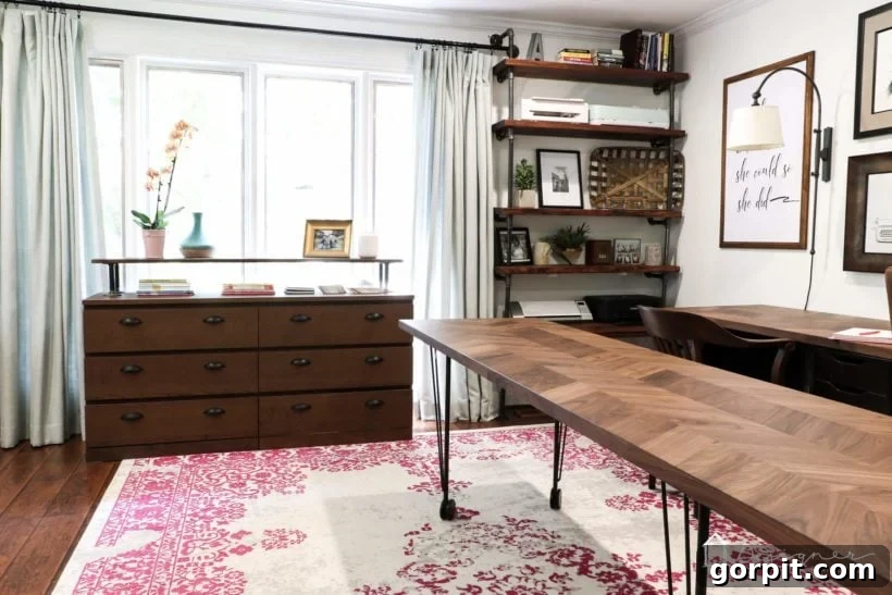 Industrial style home office with a slightly cluttered feel and limited specialized storage.