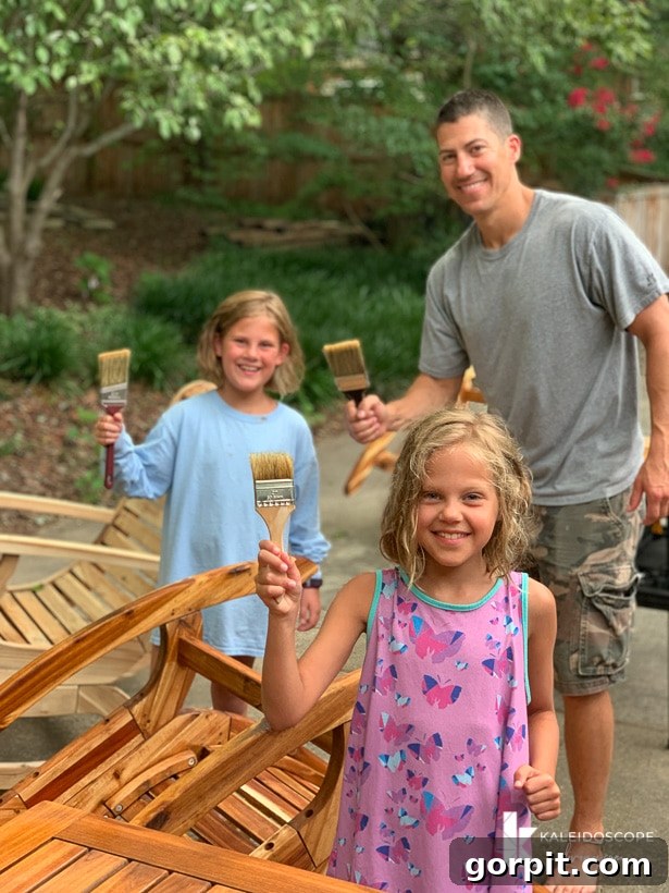 Bring Your Teak Back to Life: 4 Simple Steps 13 Family applying teak oil to outdoor furniture together