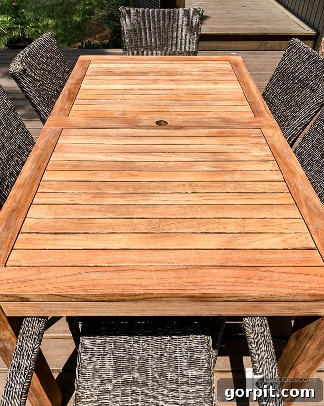 Bring Your Teak Back to Life: 4 Simple Steps 15 Outdoor teak table after successful restoration with teak oil