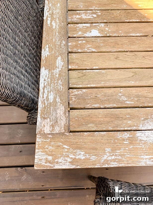 Bring Your Teak Back to Life: 4 Simple Steps 6 Unevenly weathered teak outdoor table, close-up