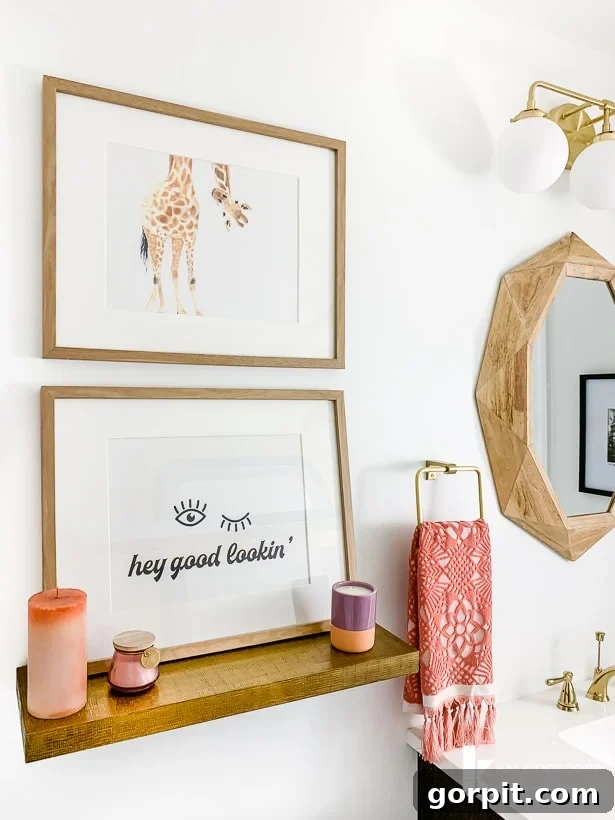 Free powder room art print displayed in a modern and colorful bathroom setting.