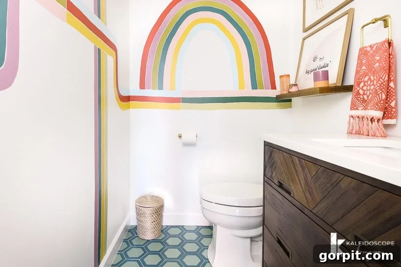 Colorful powder room with cement tile and wall mural