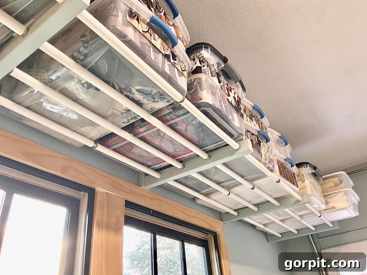 DIY overhead conveyor belt garage storage