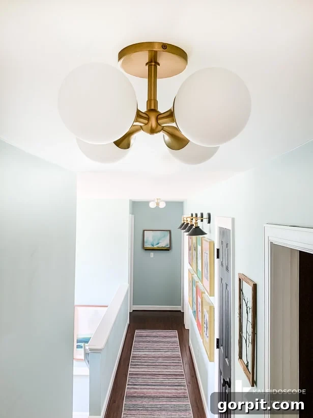Upstairs Hallway's Colorful Glow-Up 7 Finished modern colorful upstairs hallway makeover with new lighting