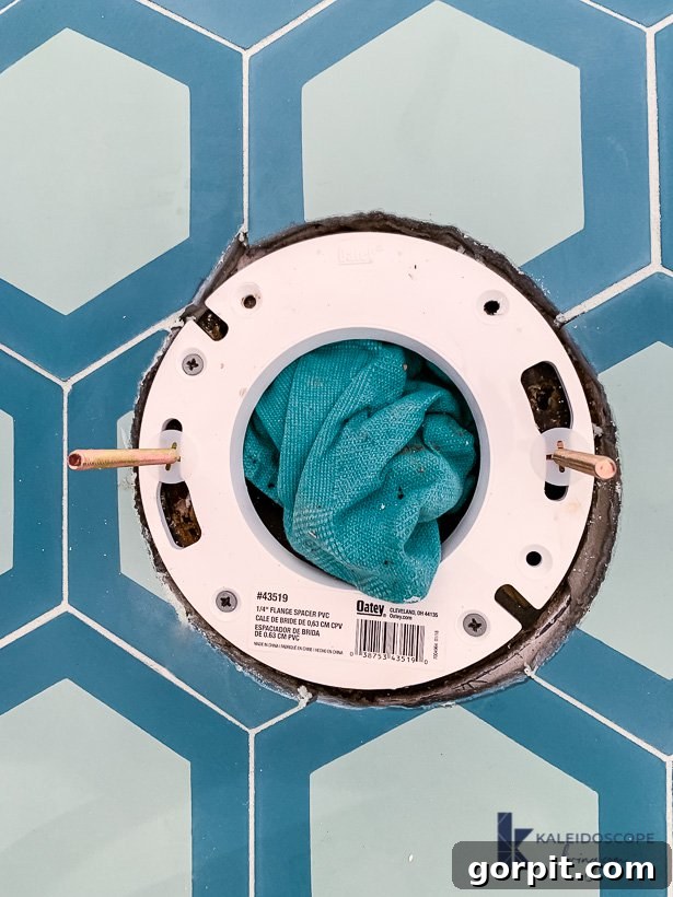 Properly positioning toilet bolts in the flange repair ring for secure installation