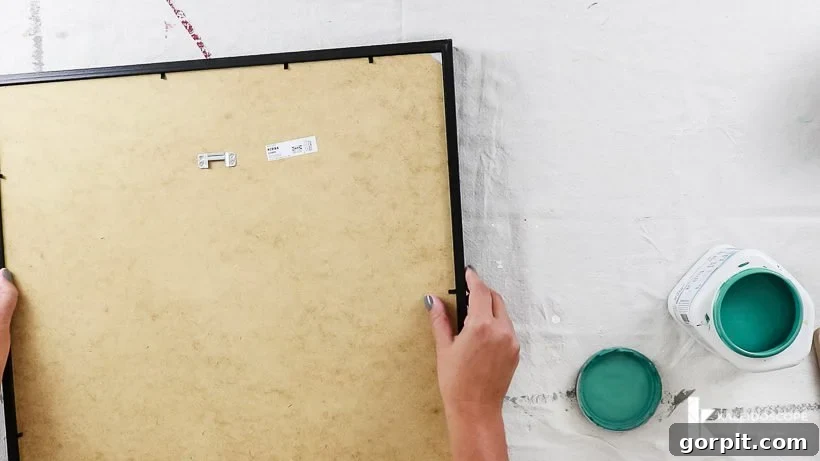 Preparing IKEA Ribba frames and mats for painting a colorful photo gallery wall