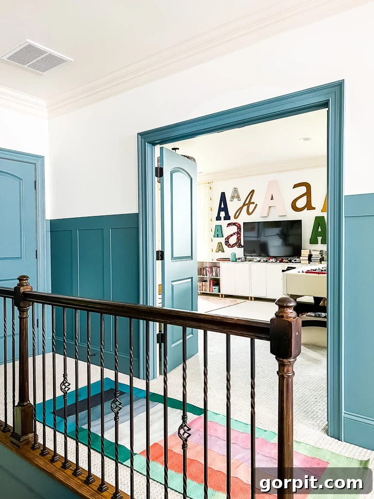 hallway with blue doors, trim and board and batten 