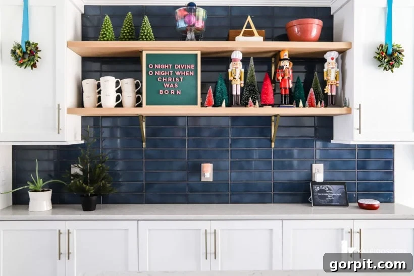 A Christmas Kaleidoscope Home Tour 11 open kitchen shelved with colorful christmas decorations