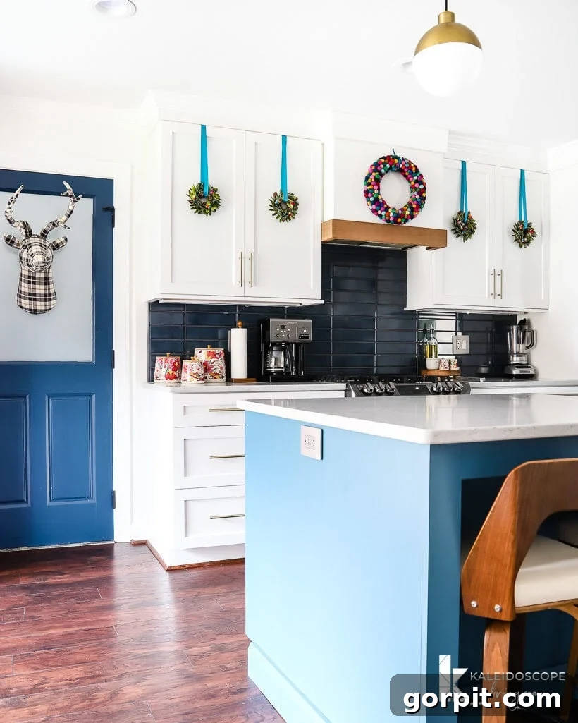 A Christmas Kaleidoscope Home Tour 12 colorful christmas decorations in white and blue kitchen