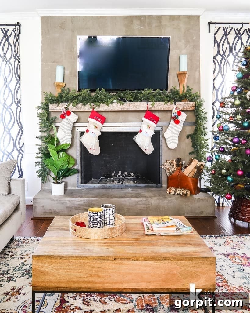 A Christmas Kaleidoscope Home Tour 16 concrete fireplace decorate for christmas