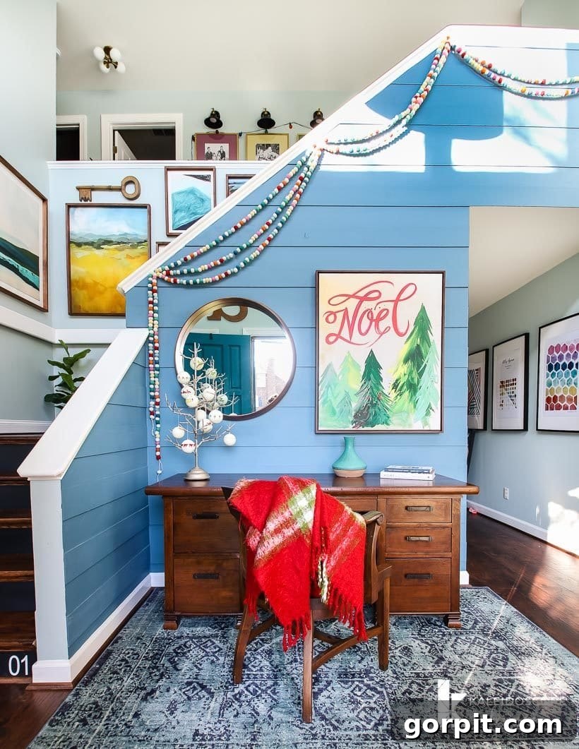 A Christmas Kaleidoscope Home Tour 2 colorful foyer decorated for Christmas
