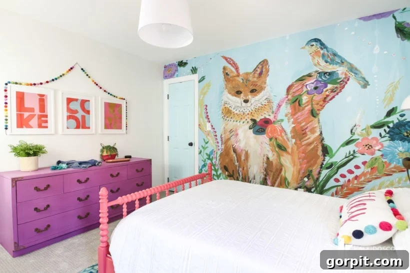 Colorful girl's bedroom featuring a vibrant fox wall mural and a purple dresser with subtle artwork.