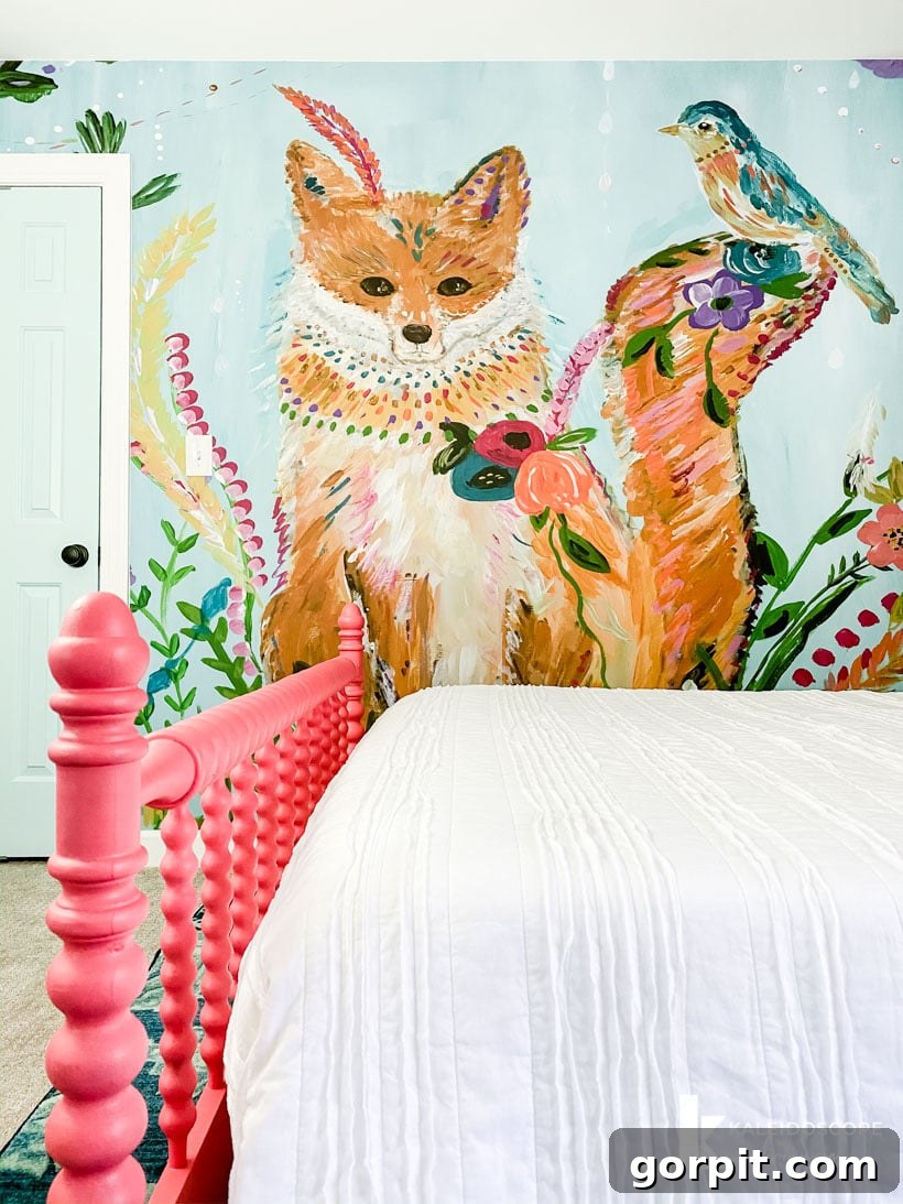 Vibrant fox wall mural in Attley's colorful girl's bedroom, complementing the overall whimsical theme.