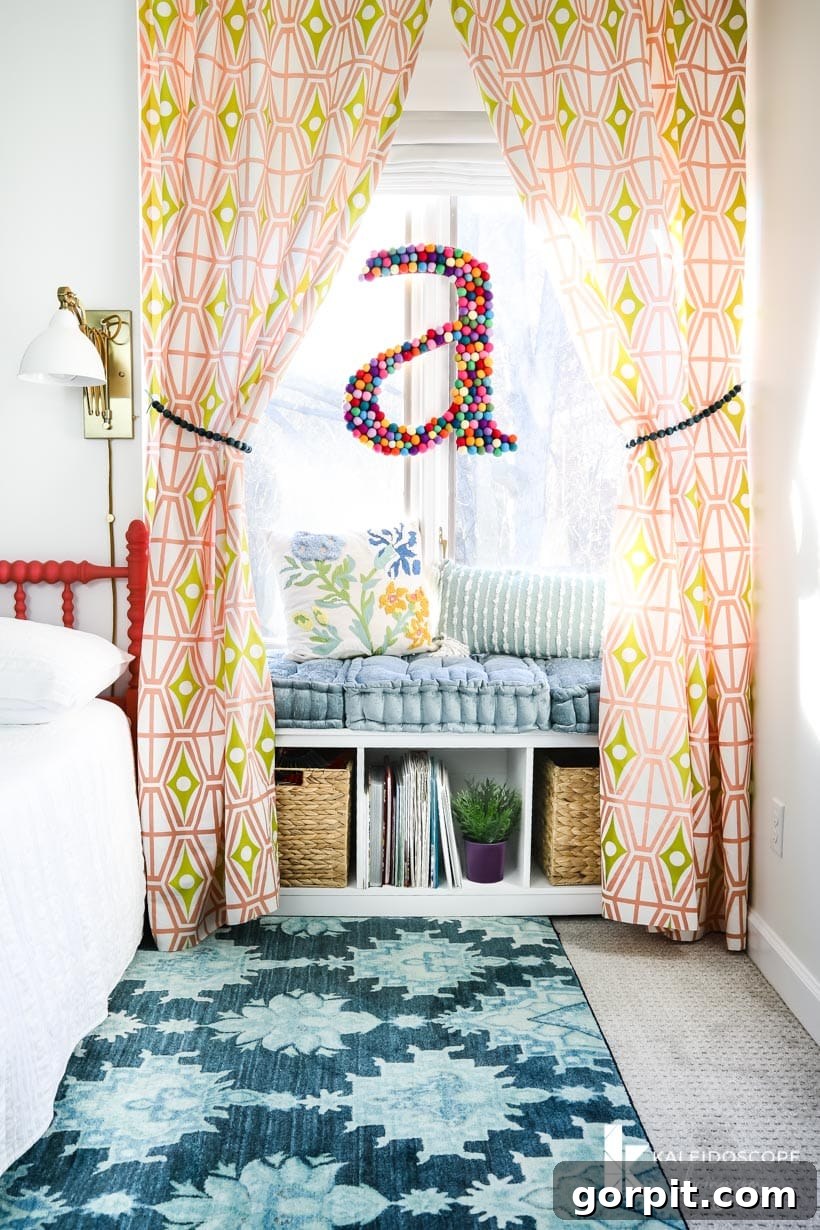 A vibrant perspective of the colorful girl's bedroom, showcasing the reading nook and desk area.