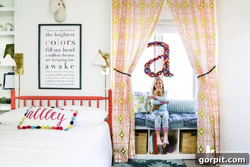 Wide shot of Attley's colorful little girl's bedroom, highlighting the vibrant decor and cohesive design.