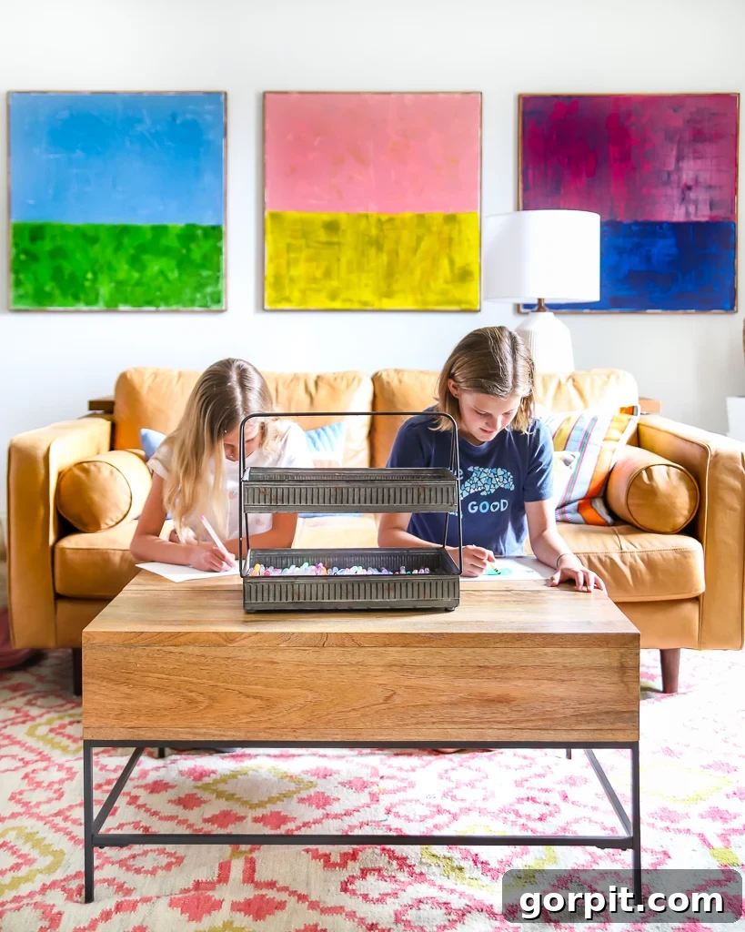 Taming Playroom Chaos: Smart Storage Solutions 11 Colorful playroom showing a desk area with art supplies