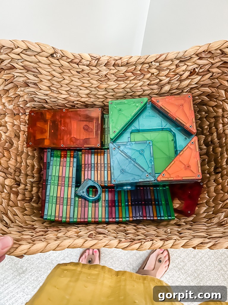 Taming Playroom Chaos: Smart Storage Solutions 13 Storage basket filled with Magnatiles in a playroom