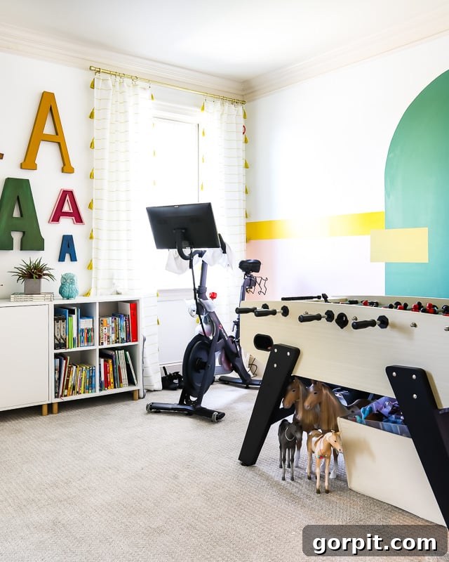 Taming Playroom Chaos: Smart Storage Solutions 15 Colorful family bonus room with foosball table and hidden storage