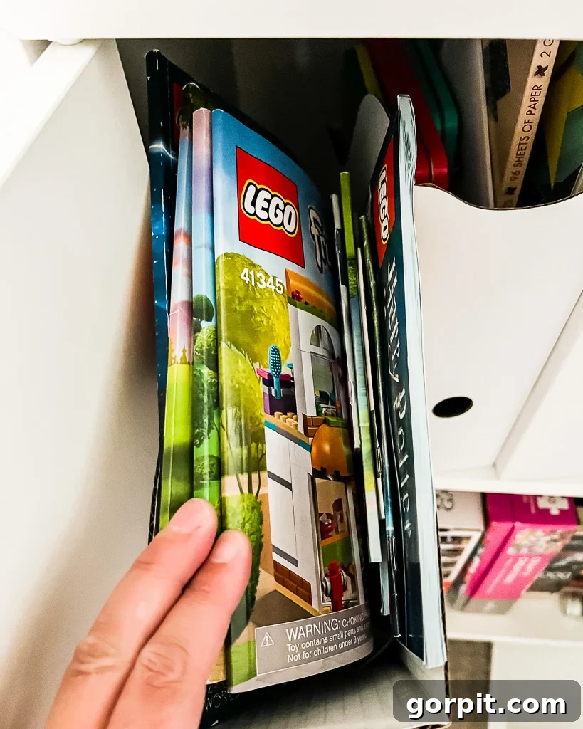 Taming Playroom Chaos: Smart Storage Solutions 4 Inside a playroom cabinet showing organized craft supplies