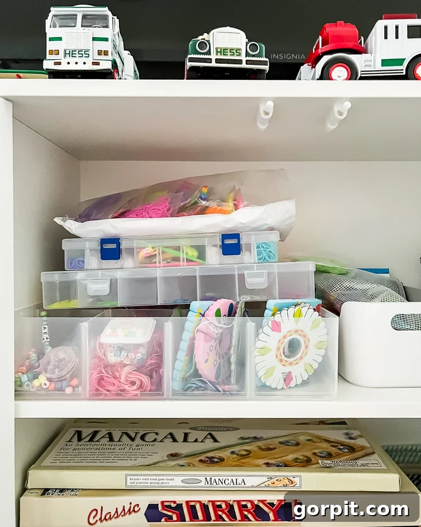 Taming Playroom Chaos: Smart Storage Solutions 5 Playroom cabinet interior with various craft items neatly grouped