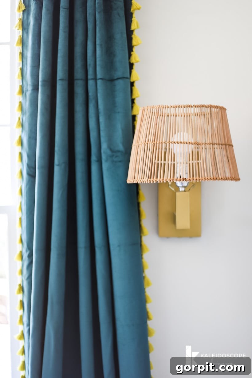 Boho curtains and updated wall sconce in home office